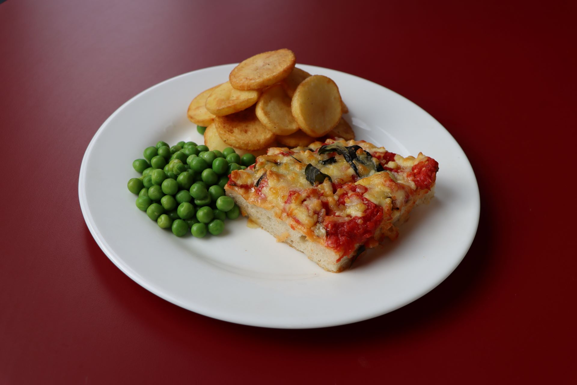 Cheese and Tomato Pizza with Saute Potatoes and Peas