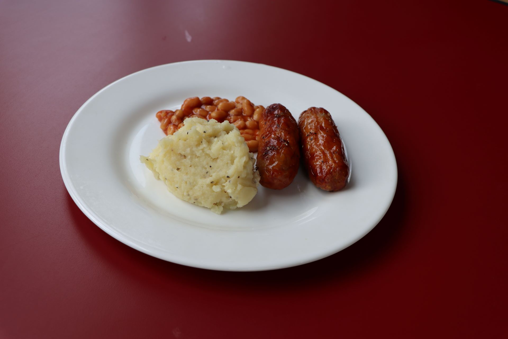 Local Butcher's Sausage with a Creamy Mash and Beans
