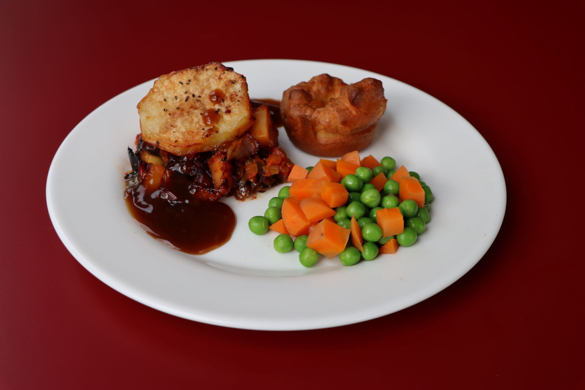 Autumn Vegetable Hot Pot with Yorkshire Pudding, Diced Carrots, Peas and Gravy