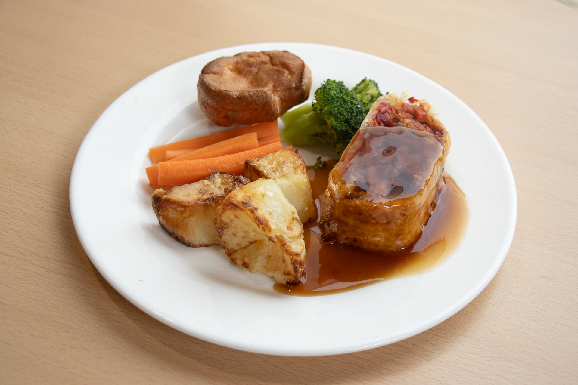 Vegetable Wellington, with Roast Potatoes, Carrots, Peas, Yorkshire Pudding and Gravy